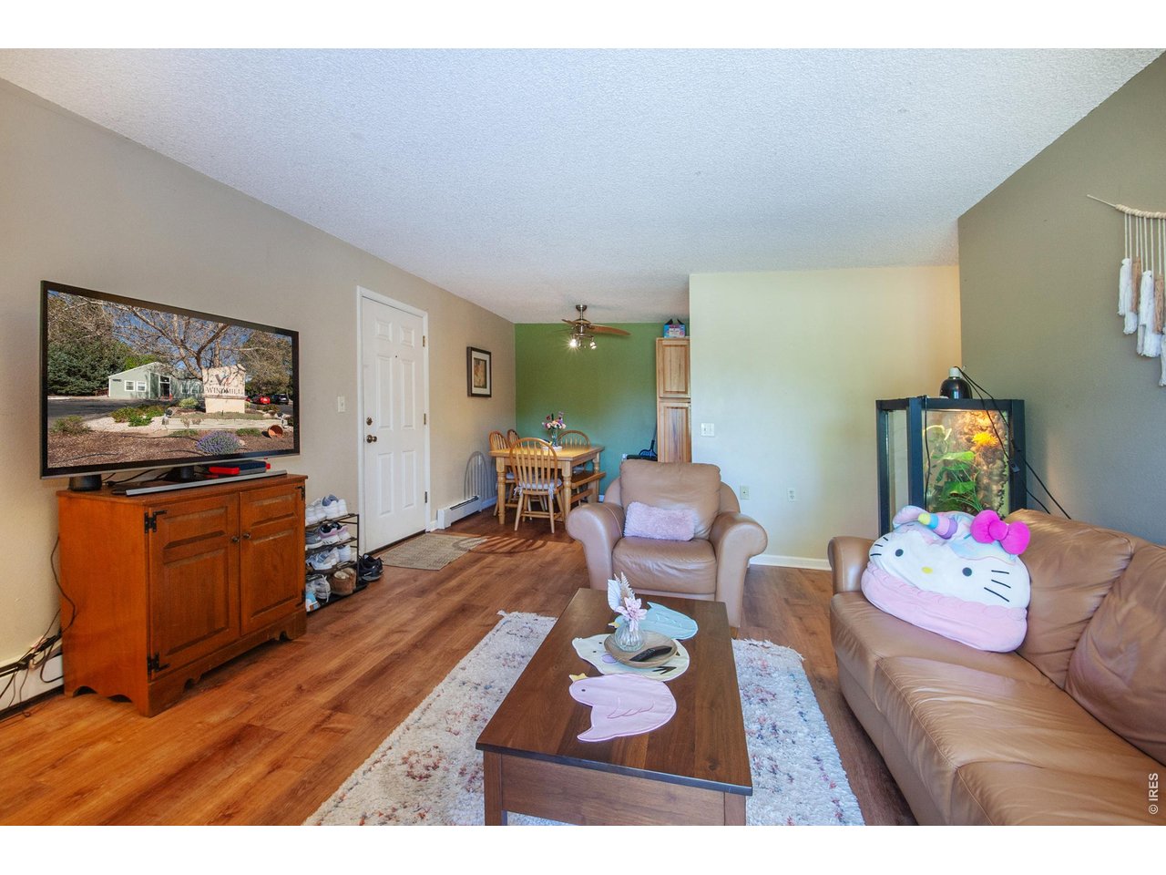 3400 Stanford Road, Unit 111 Fort Collins, CO 80525 - Photo 1 of 30 Living Room view from Patio Door