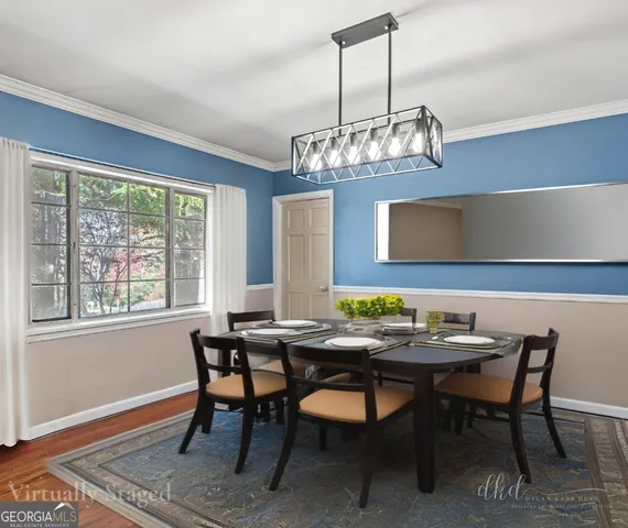 a kitchen with a sink cabinets and window