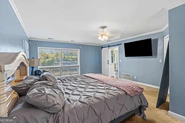 a bathroom with a shower curtain and a sink