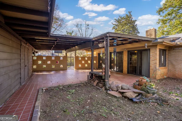 a view of a back yard of the house