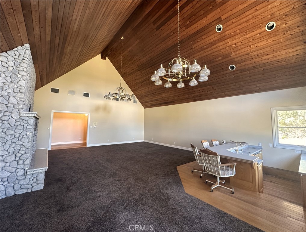 26050 Jan Valerie Road Murrieta, CA 92562 - Photo 11 of 47 a view of a room with a chandelier and living room view