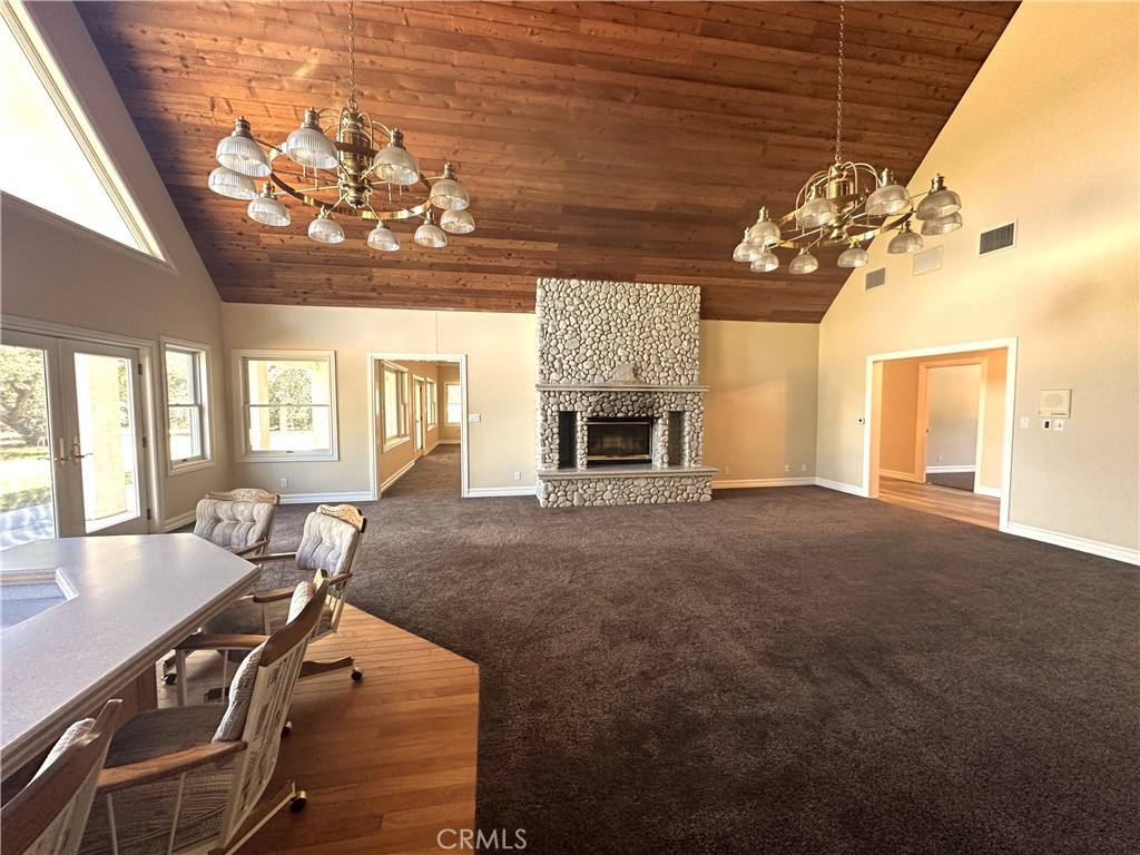 26050 Jan Valerie Road Murrieta, CA 92562 - Photo 15 of 47 a view of a livingroom with furniture window and wooden floor