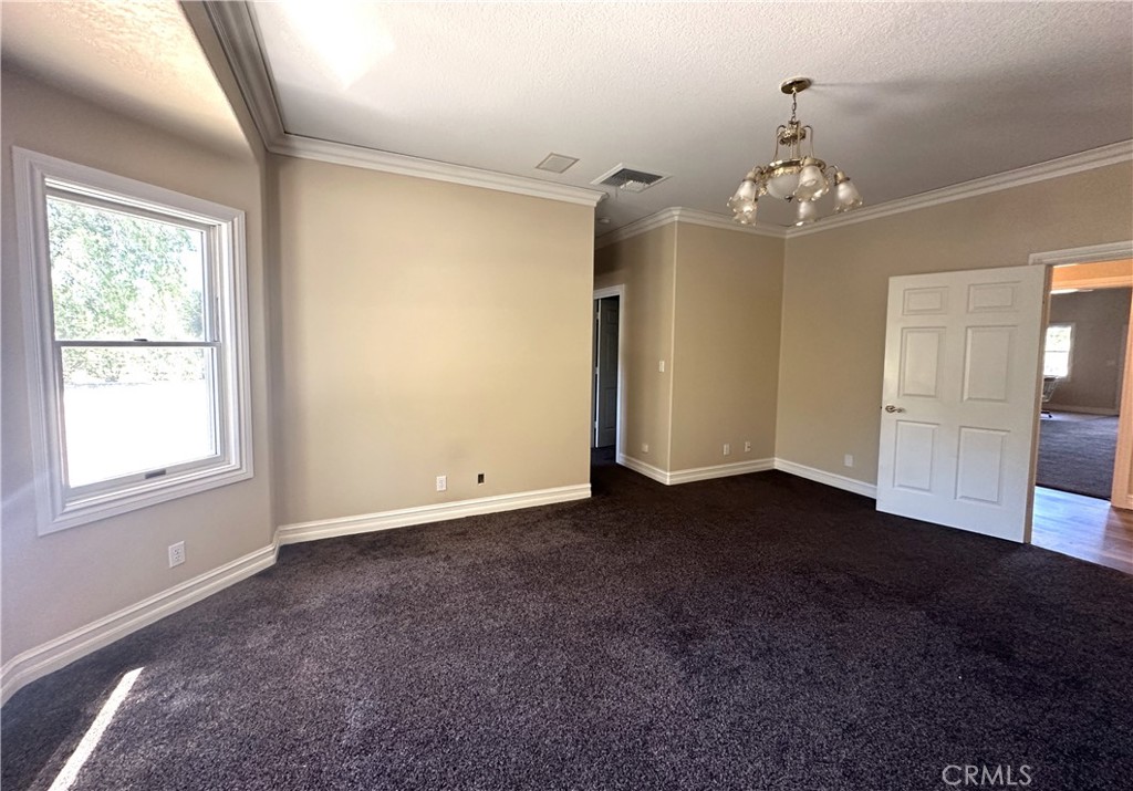 26050 Jan Valerie Road Murrieta, CA 92562 - Photo 17 of 47 wooden floor in an empty room with a window