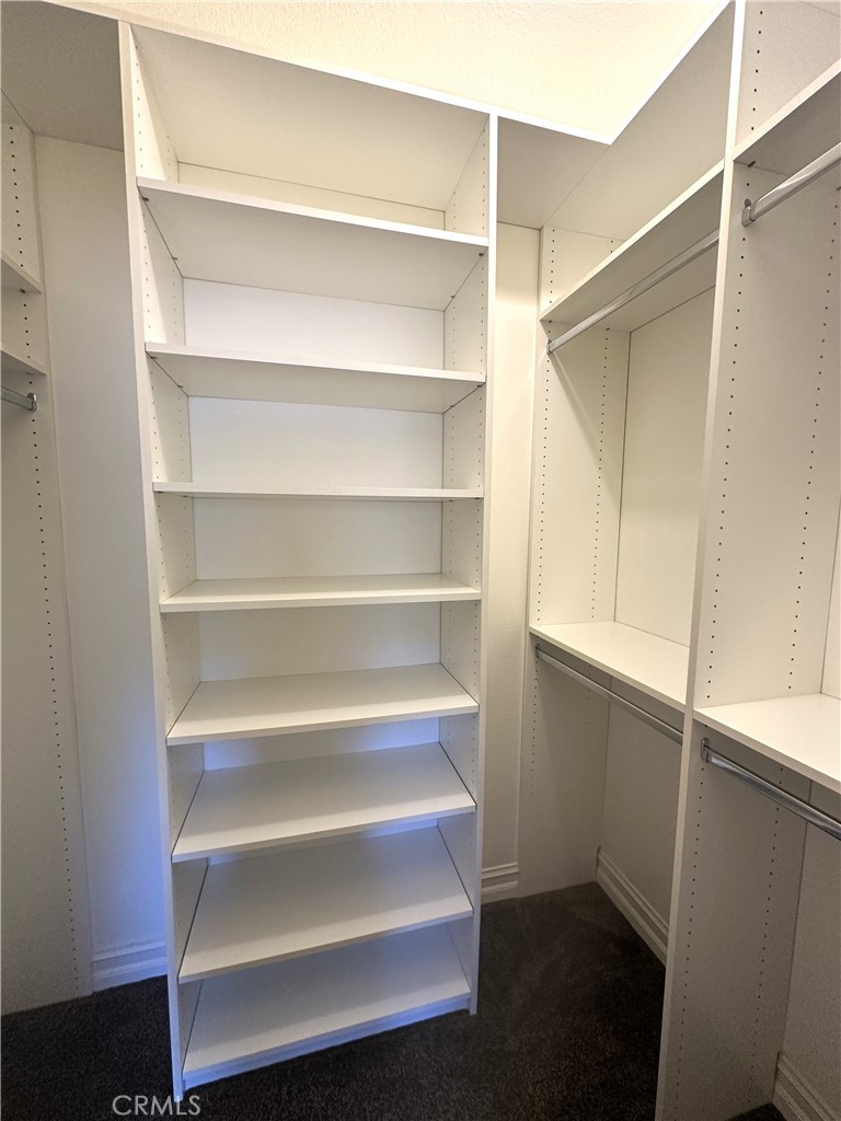 26050 Jan Valerie Road Murrieta, CA 92562 - Photo 18 of 47 a view of walk in closet with empty racks