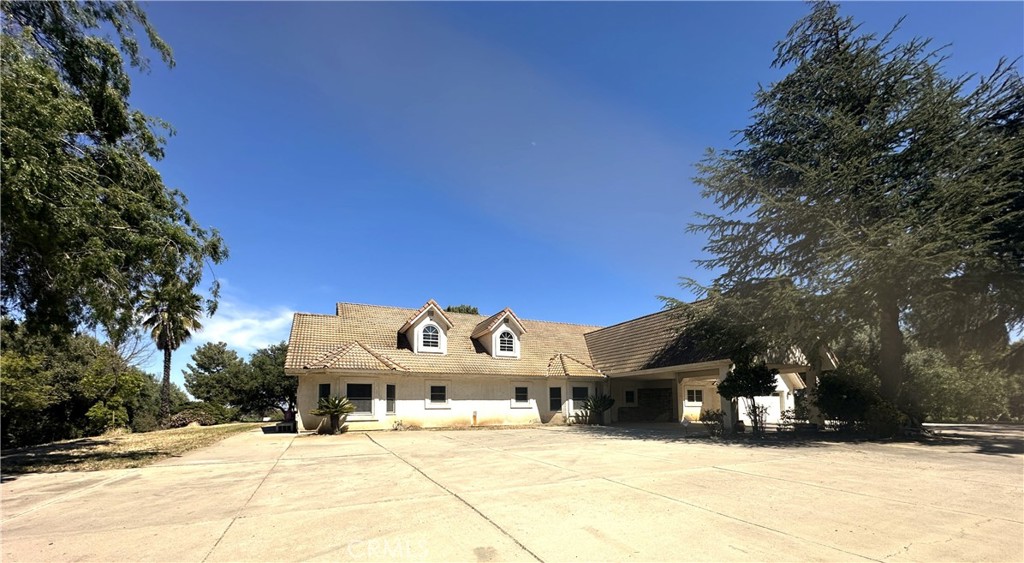 26050 Jan Valerie Road Murrieta, CA 92562 - Photo 2 of 47 a view of a town with large trees