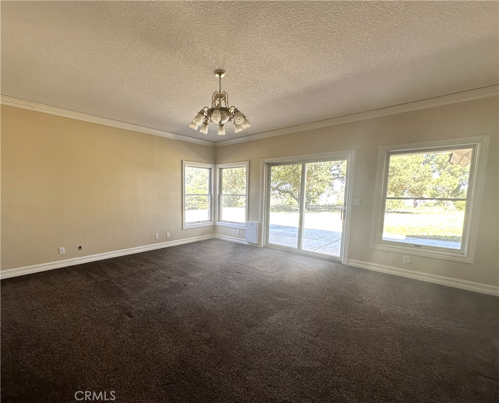 26050 Jan Valerie Road Murrieta, CA 92562 - Photo 27 of 47 a view of an empty room with a window
