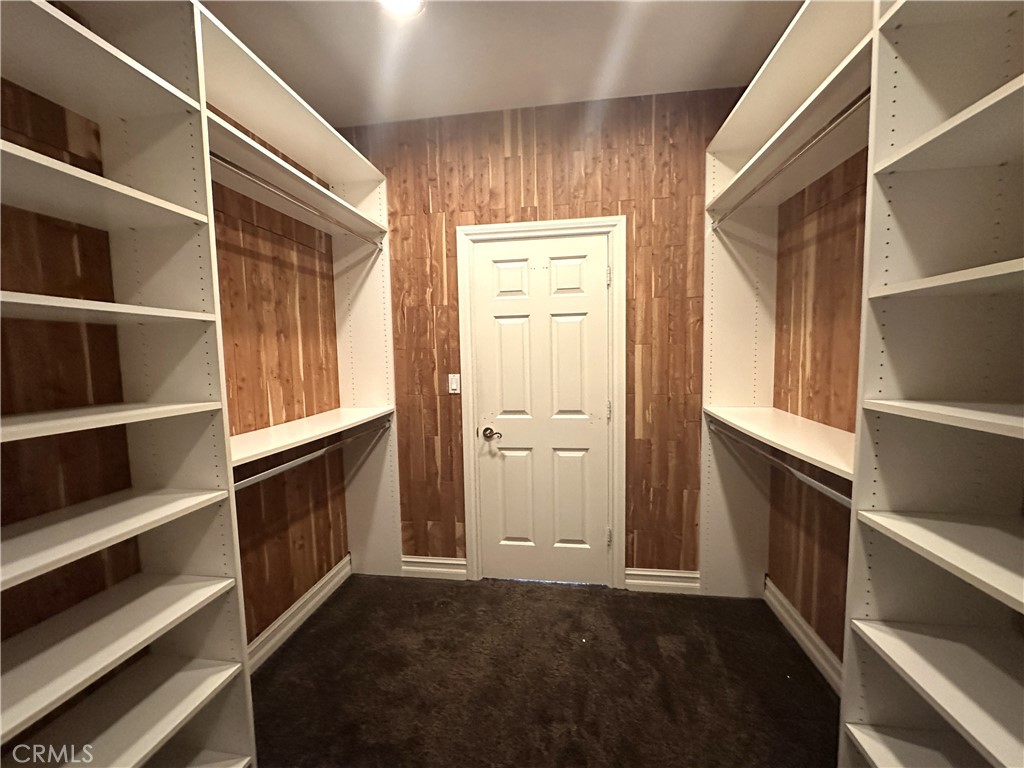26050 Jan Valerie Road Murrieta, CA 92562 - Photo 33 of 47 a view of walk in closet with empty racks