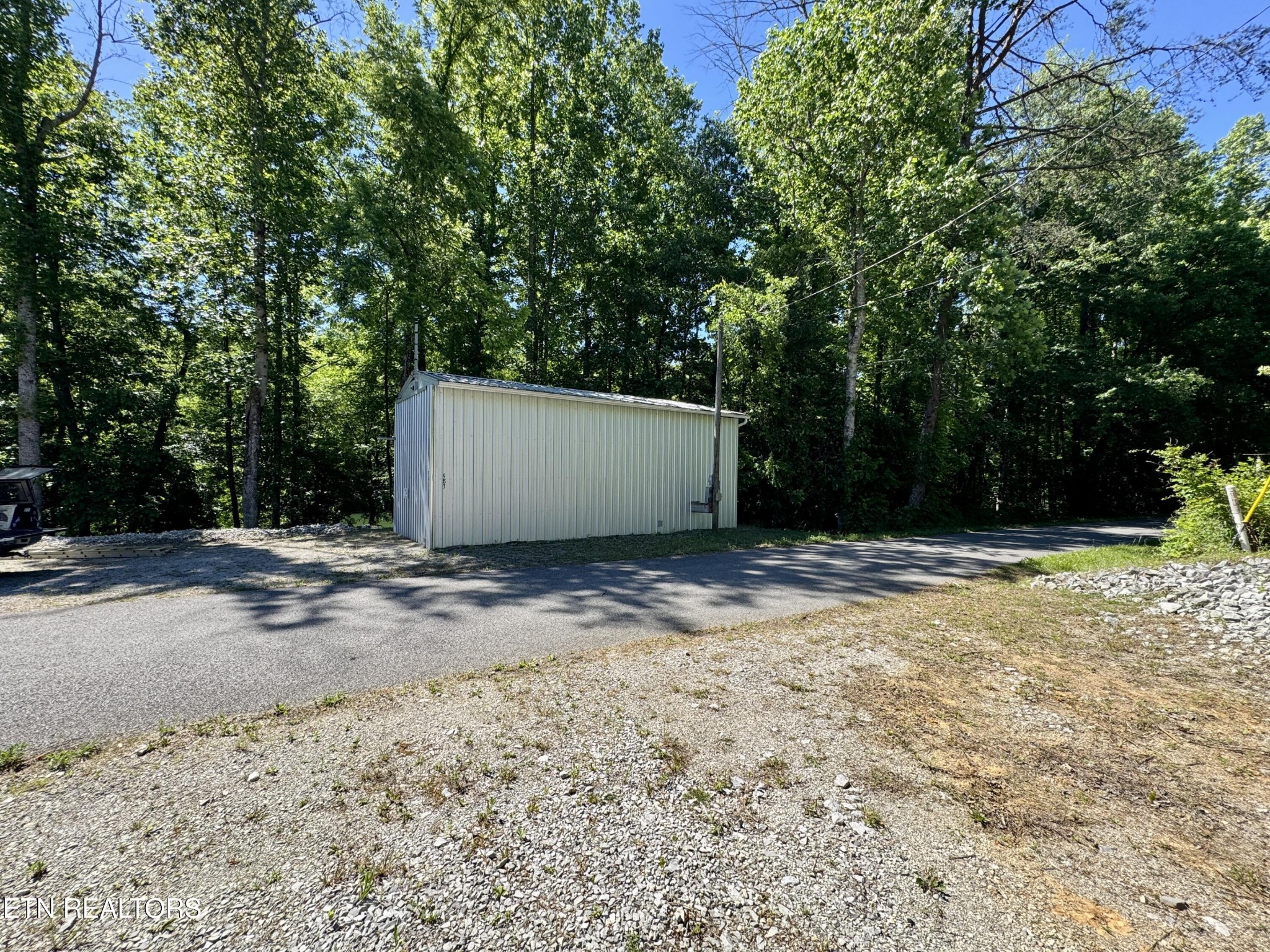 983 River Hill Road Sparta, TN 38583 - Photo 34 of 47 a view of a backyard with a tree