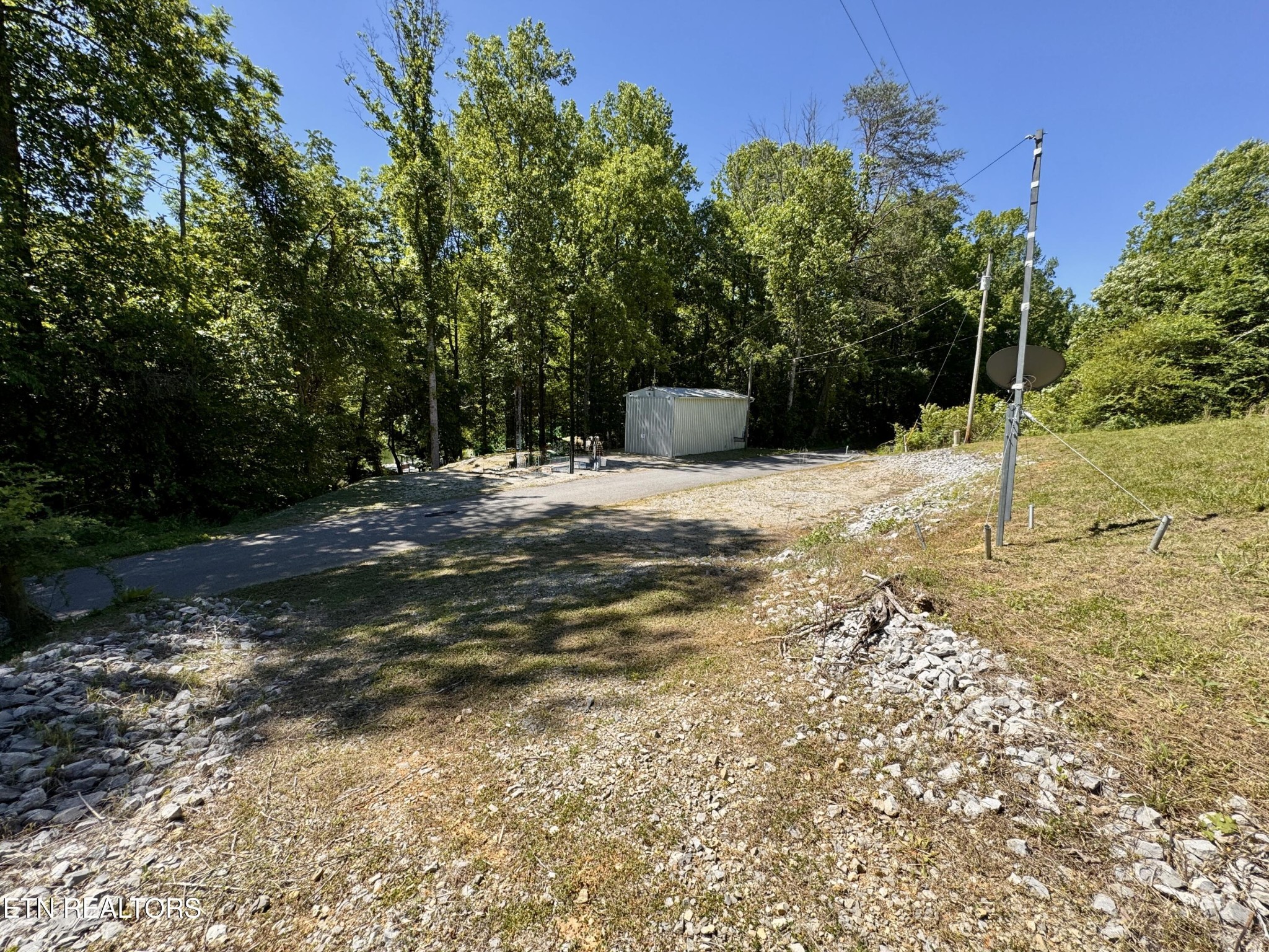 983 River Hill Road Sparta, TN 38583 - Photo 45 of 47 a view of a backyard of the house