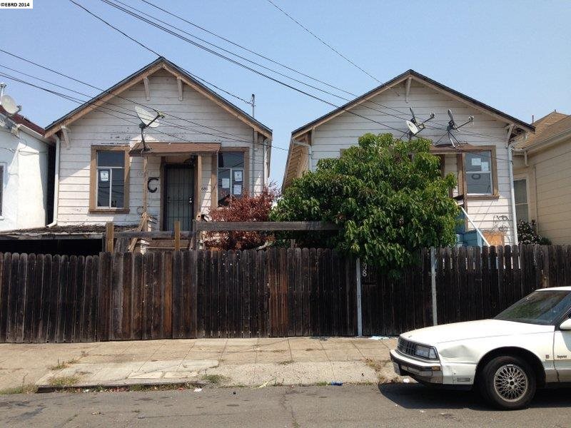 1678 16th Street Oakland, CA 94607 - Photo 1 of 1 a front view of a house with a garden