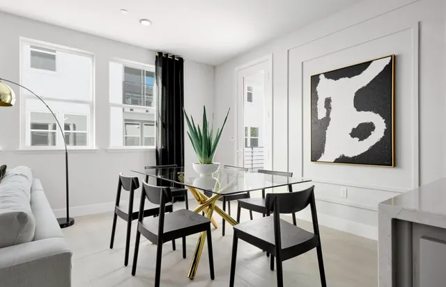 a view of a livingroom with furniture and window