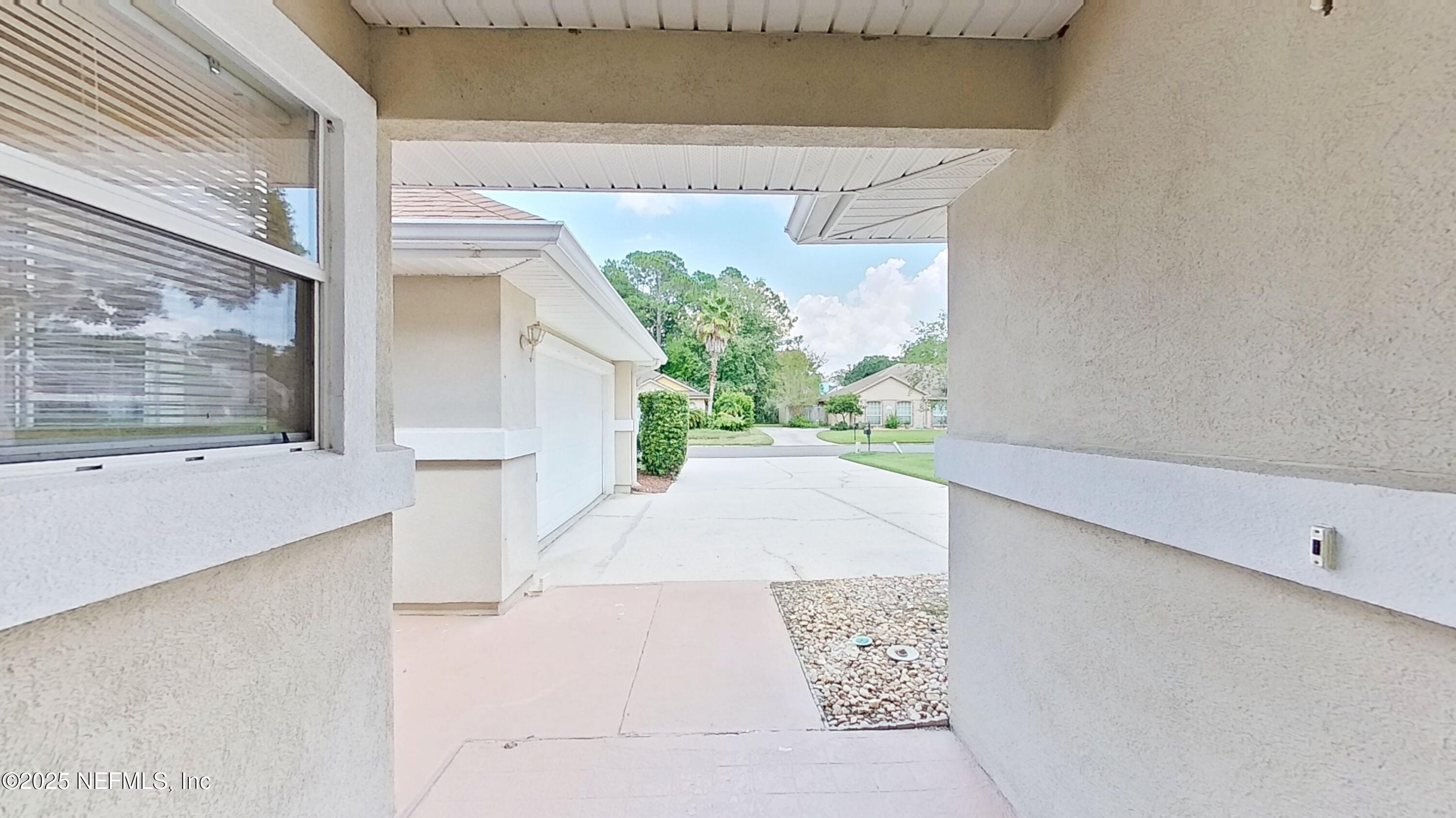 1488 Marsh Rabbit Way Fleming Island, FL 32003 - Photo 19 of 35 a view of a entrance