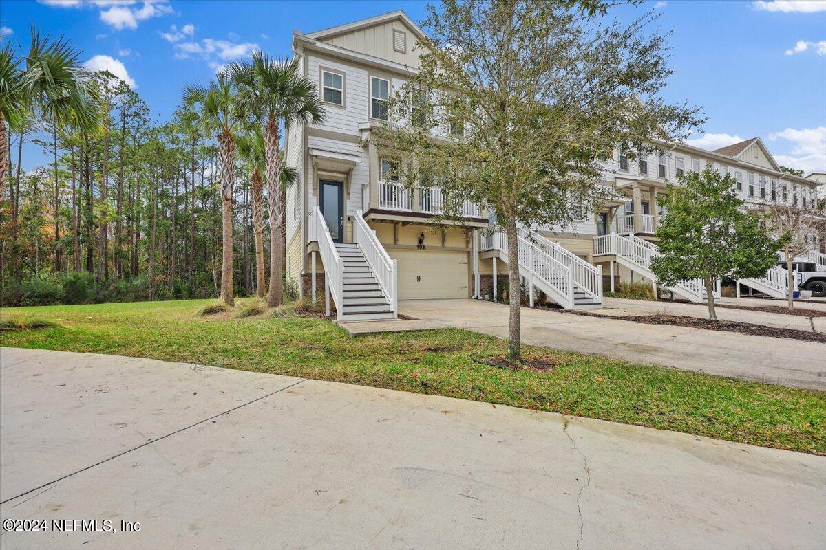 103 Spring Tide Way Ponte Vedra, FL 32081 - Photo 1 of 26 a house with tree in front of it