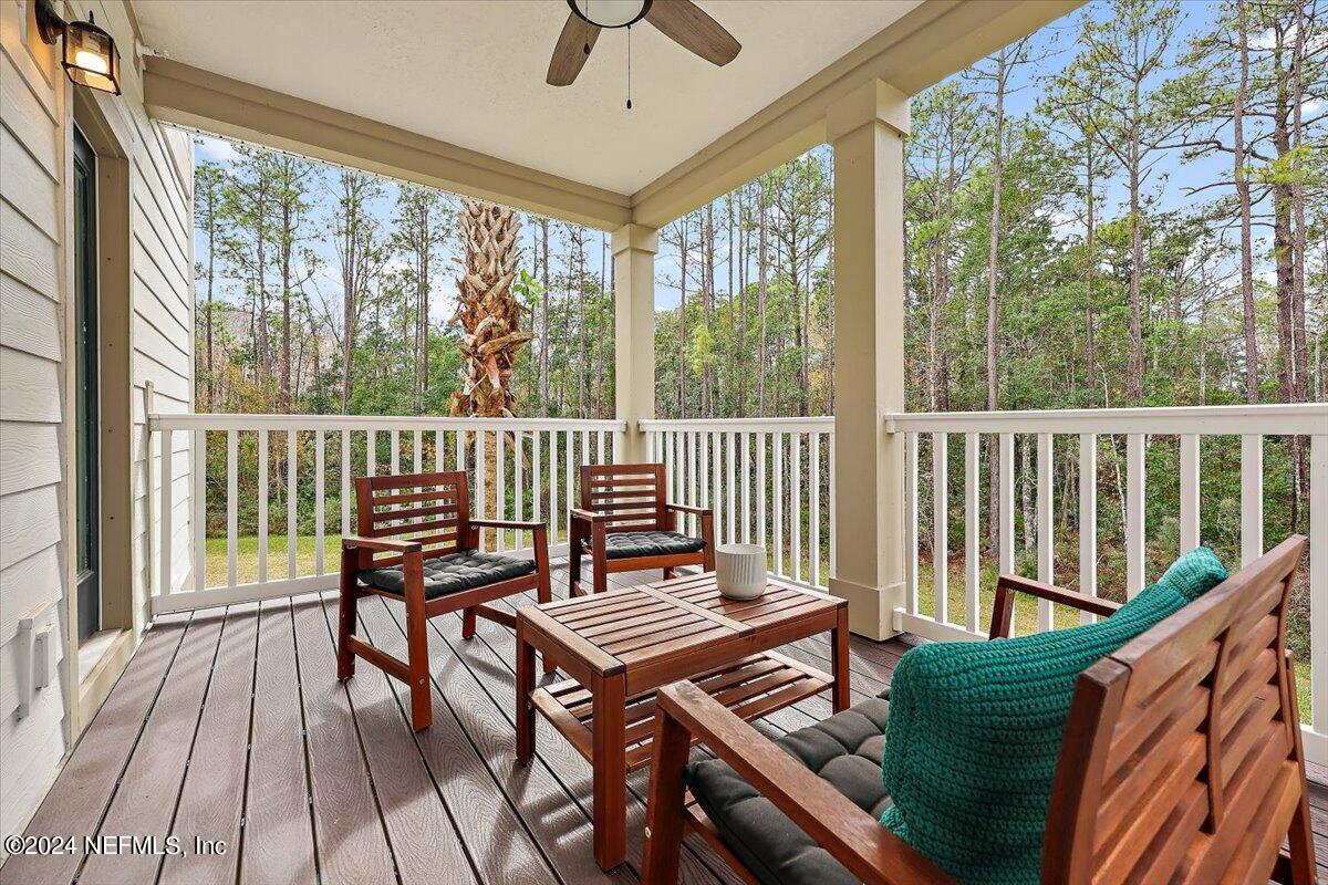 103 Spring Tide Way Ponte Vedra, FL 32081 - Photo 13 of 26 a view of a wooden chairs on the deck