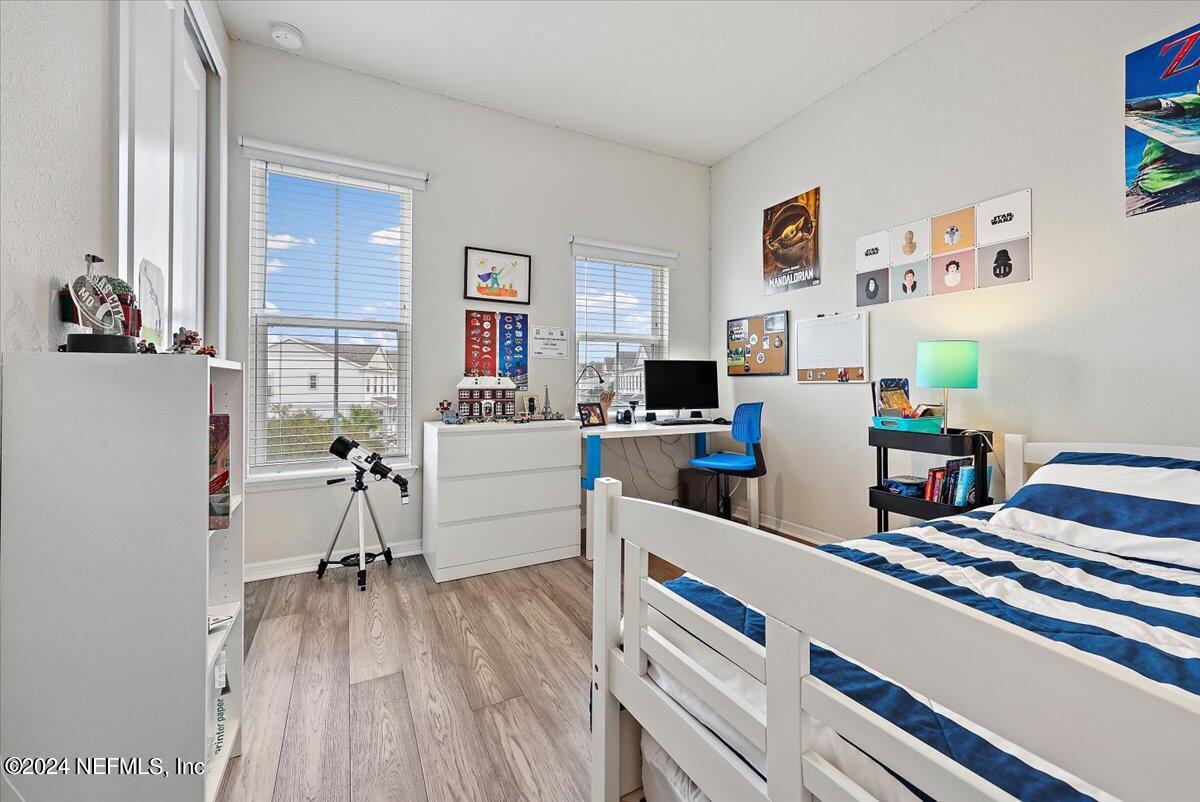 103 Spring Tide Way Ponte Vedra, FL 32081 - Photo 20 of 26 a work room with furniture and wooden floor