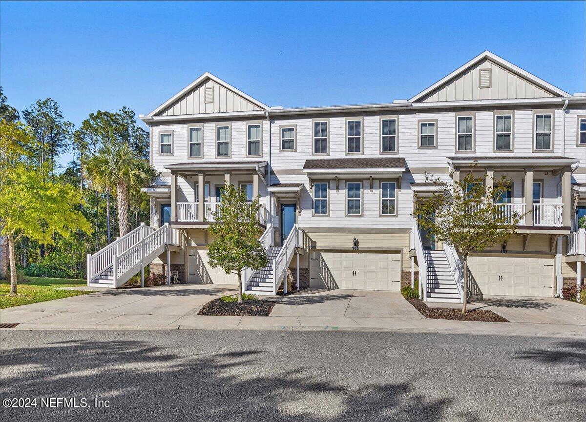 103 Spring Tide Way Ponte Vedra, FL 32081 - Photo 2 of 26 front view of a house with a street