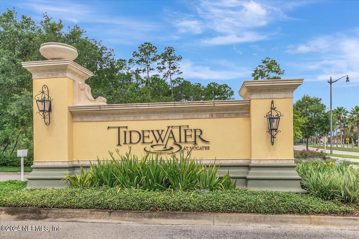 103 Spring Tide Way Ponte Vedra, FL 32081 - Photo 25 of 26 a street sign on a small building