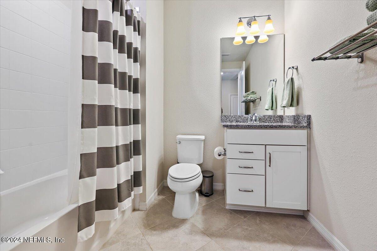 103 Spring Tide Way Ponte Vedra, FL 32081 - Photo 5 of 26 a bathroom with a sink toilet and shower