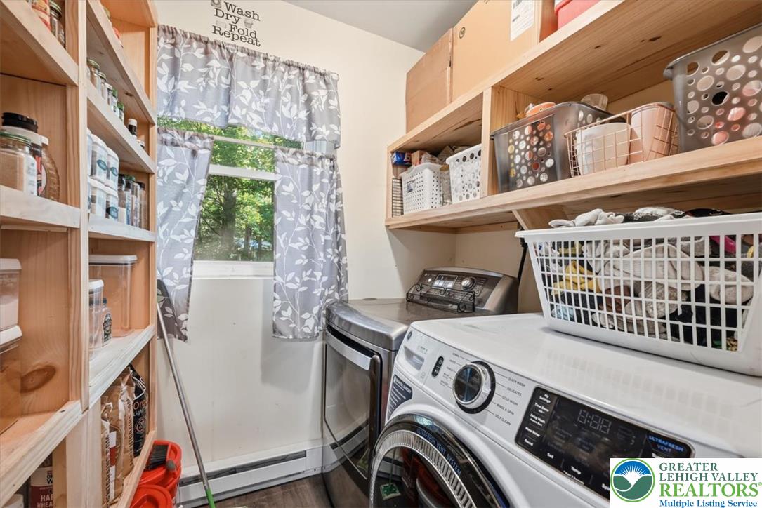 128 Chestnut Street Dingmans Ferry, PA 18328 - Photo 13 of 43 Functional laundry room offers built-in shelving and ample space.