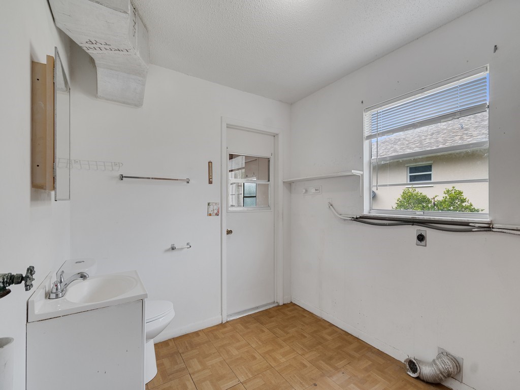418 Maple Street Sebastian, FL 32958 - Photo 16 of 28 a bathroom with a sink and a mirror