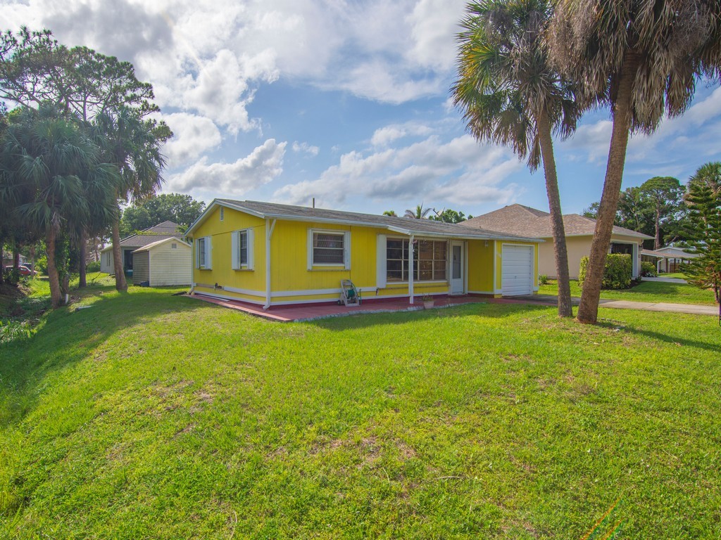 418 Maple Street Sebastian, FL 32958 - Photo 22 of 28 a view of a house with a backyard