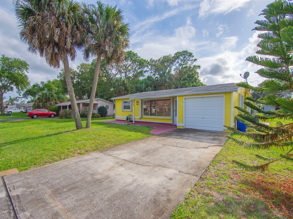 418 Maple Street Sebastian, FL 32958 - Photo 25 of 28 a view of house with outdoor space and street view