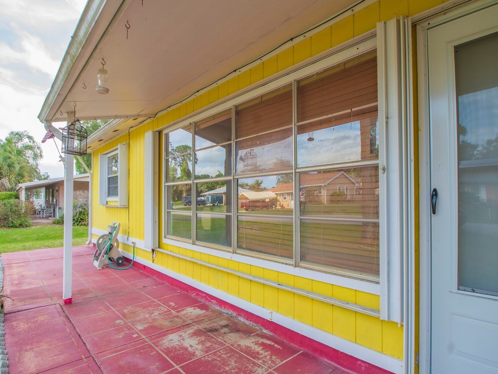 418 Maple Street Sebastian, FL 32958 - Photo 5 of 28 a view of a house with a swimming pool