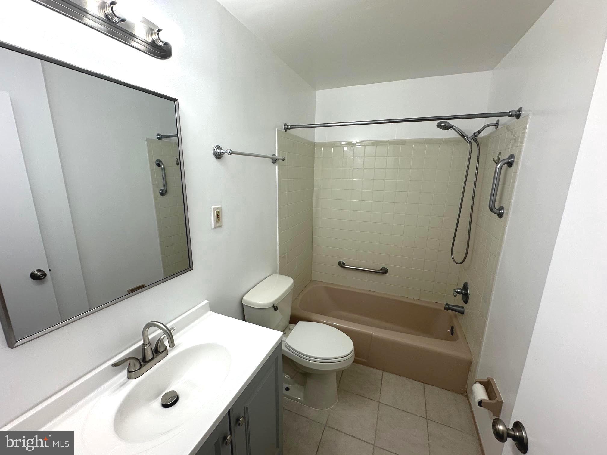 4037 Olney Laytonsville Road Olney, MD 20832 - Photo 18 of 42 a bathroom with a sink toilet and shower