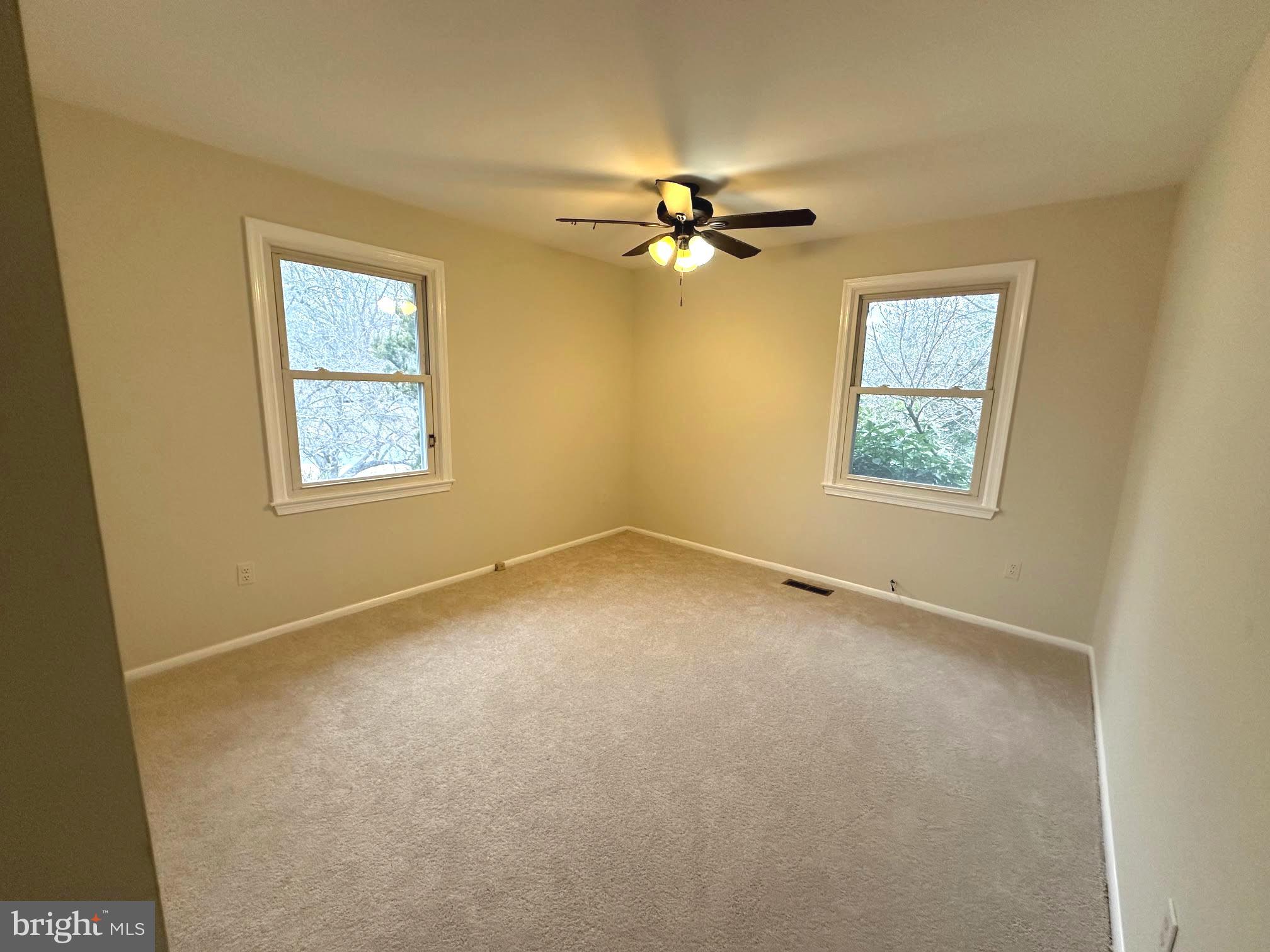 4037 Olney Laytonsville Road Olney, MD 20832 - Photo 23 of 42 a view of empty room with windows