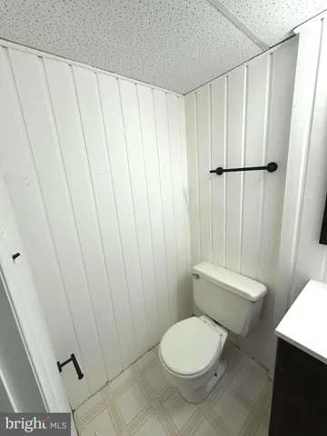 an empty room with a empty space and windows