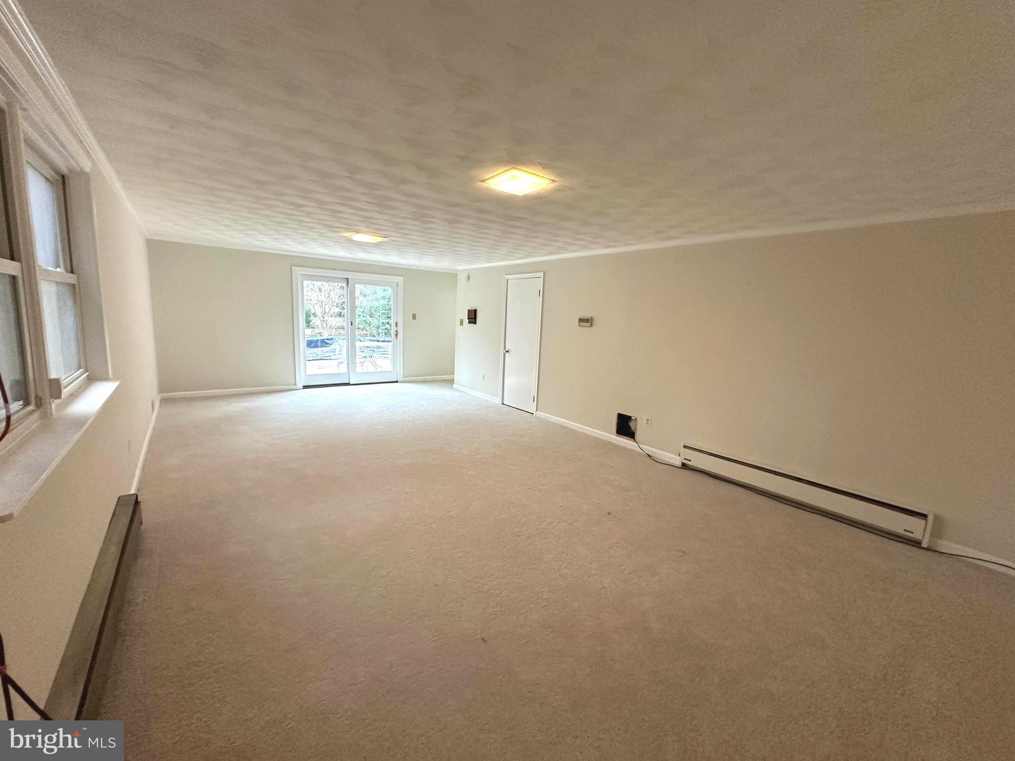 4037 Olney Laytonsville Road Olney, MD 20832 - Photo 35 of 42 Basement living room