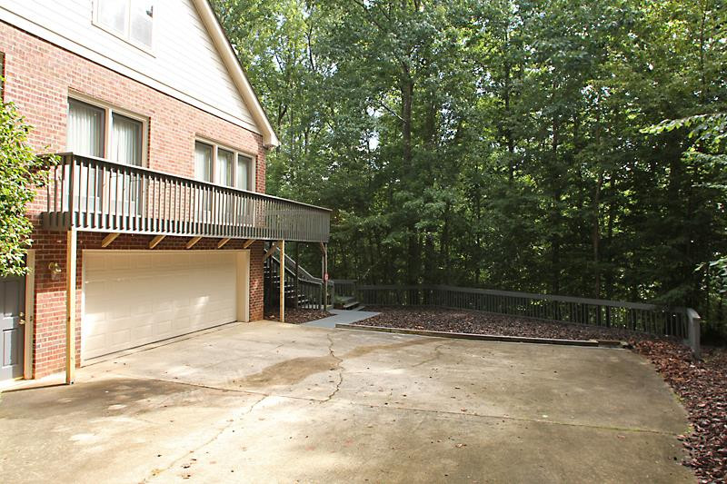 12332 Galway Drive Raleigh, NC 27613 - Photo 24 of 25 Basement garage is oversized. Perfect for your cars, and more! Garage