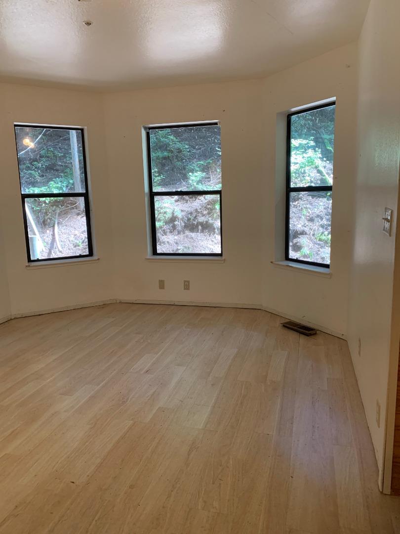 700 Laurel View Road Los Gatos, CA 95033 - Photo 4 of 15 a view of an empty room with windows
