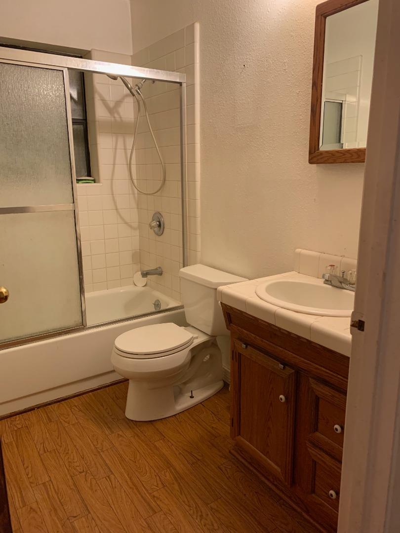 700 Laurel View Road Los Gatos, CA 95033 - Photo 10 of 15 a bathroom with a sink a toilet and shower