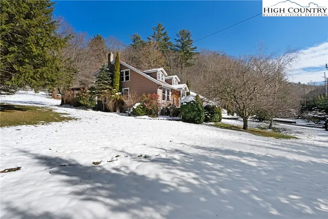 a view of a backyard of the house