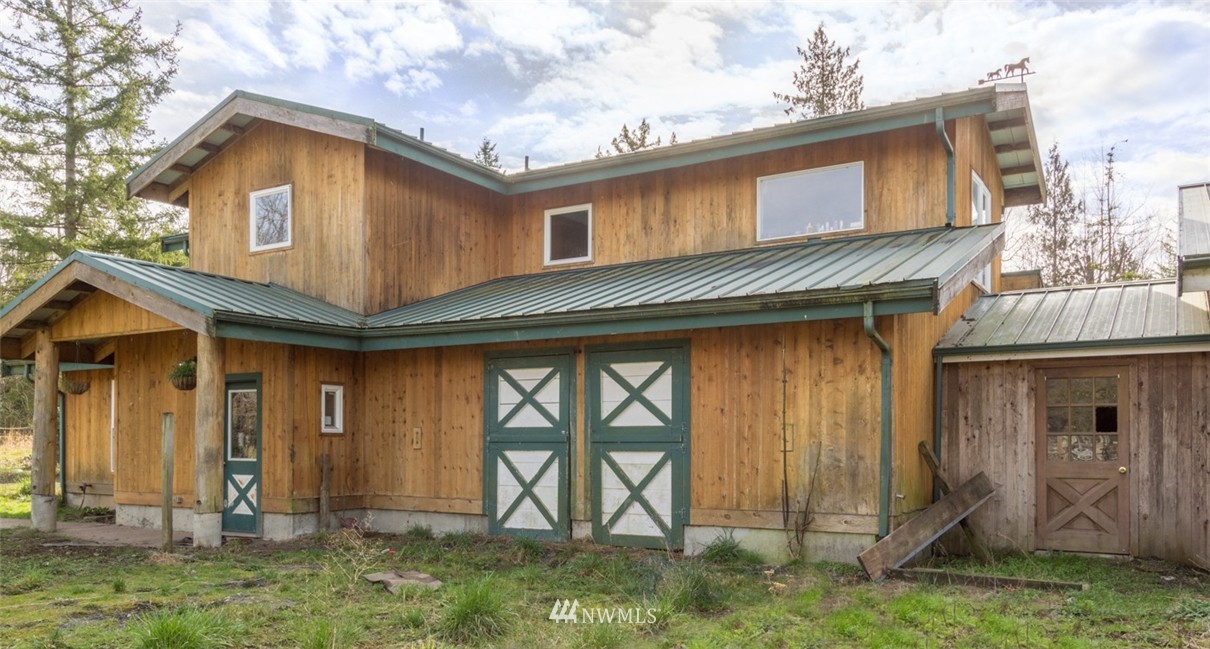 1021 Kelly Road Bellingham, WA 98226 - Photo 5 of 8 a front view of a house with garden