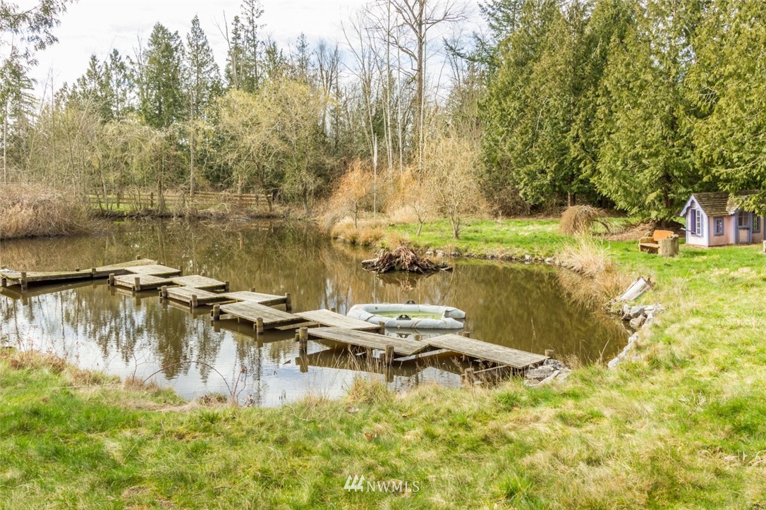 1021 Kelly Road Bellingham, WA 98226 - Photo 8 of 8 a lake view with boat and trees