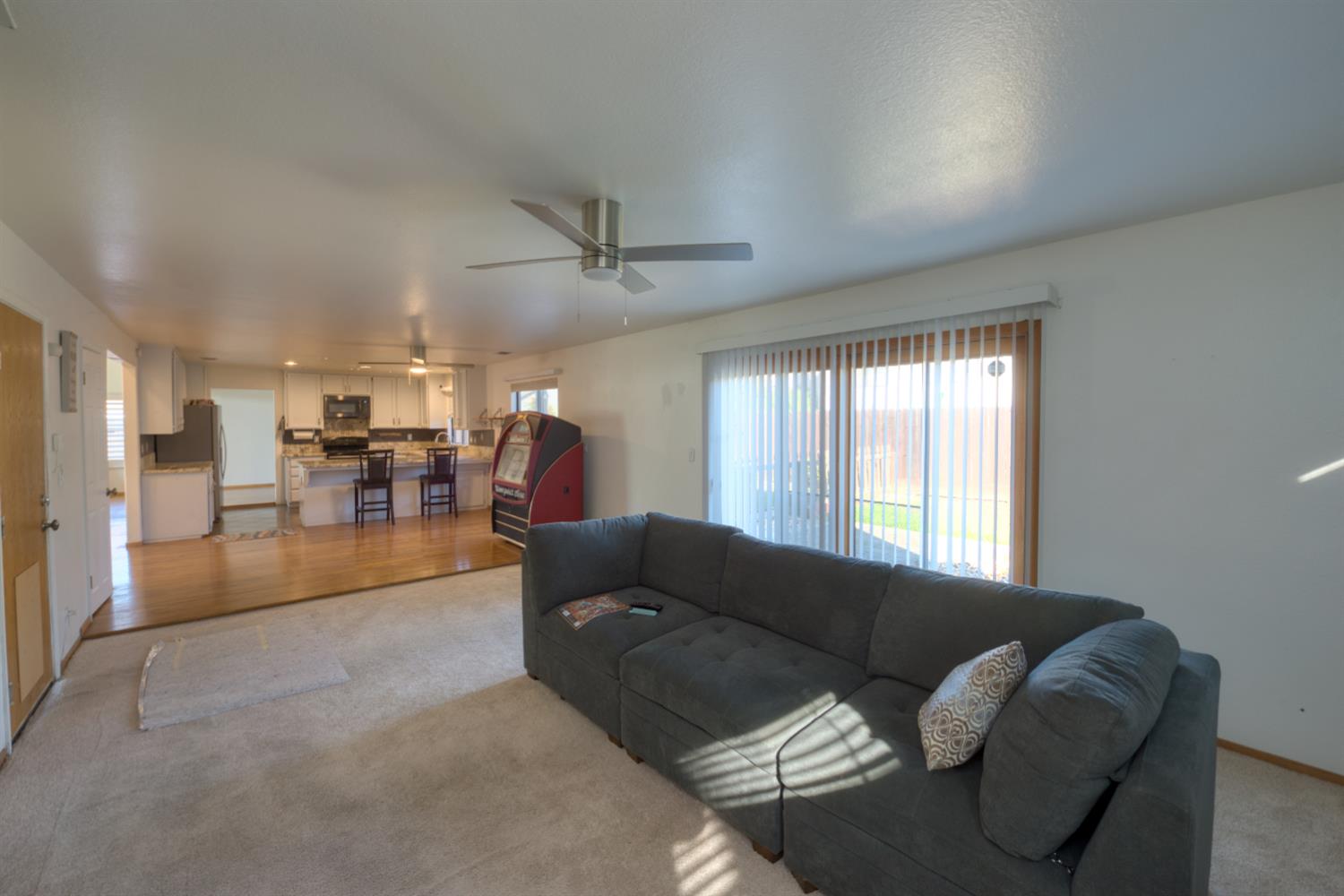 548 Hansen Court Patterson, CA 95363 - Photo 14 of 38 a living room with furniture and a large window