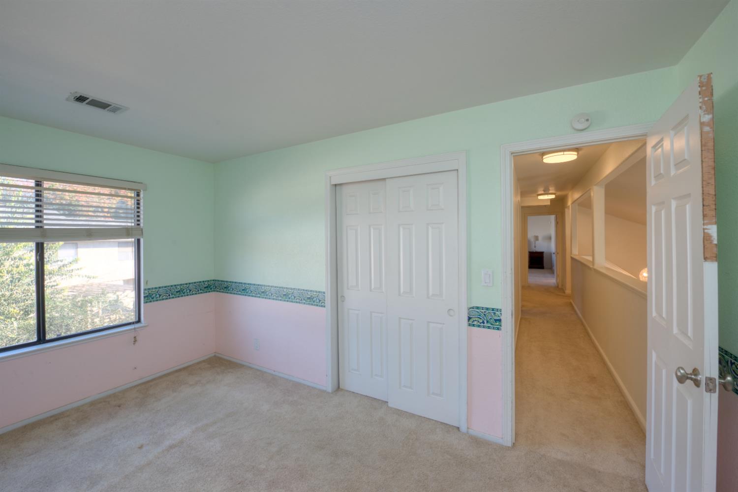 548 Hansen Court Patterson, CA 95363 - Photo 25 of 38 a view of an empty room and window