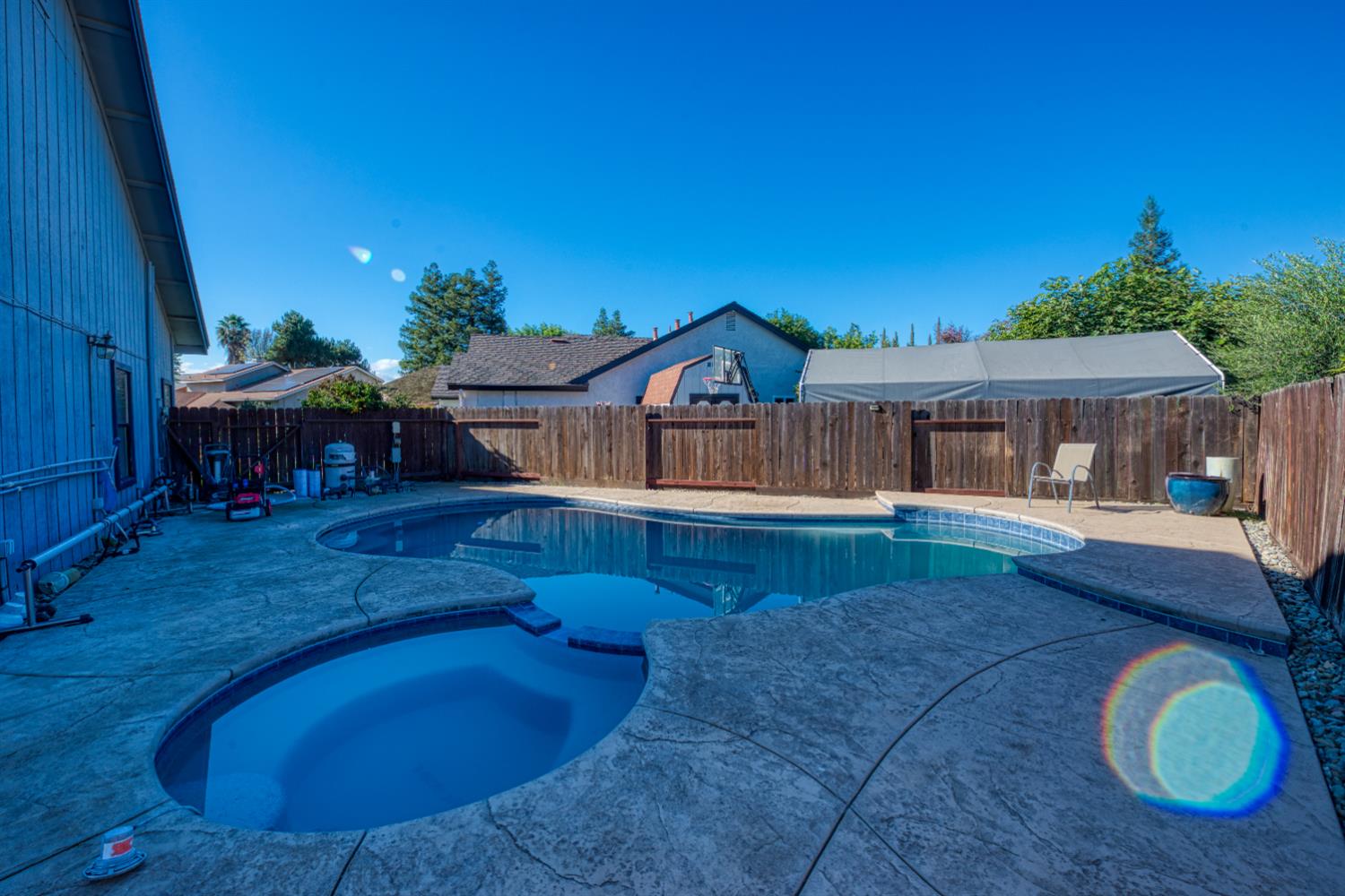 548 Hansen Court Patterson, CA 95363 - Photo 28 of 38 a view of a house with a backyard