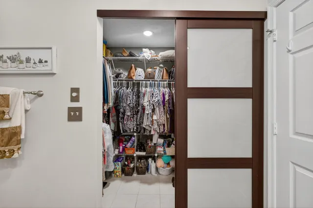 an aerial view of a houses with a yard