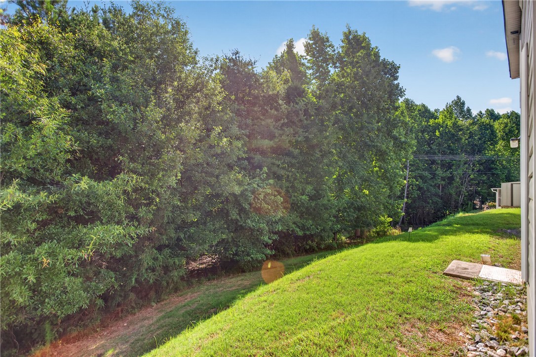 1081 Edenbrooke Circle Anderson, SC 29621 - Photo 46 of 46 A verdant hillside provides a private, natural backdrop to this home's exterior.