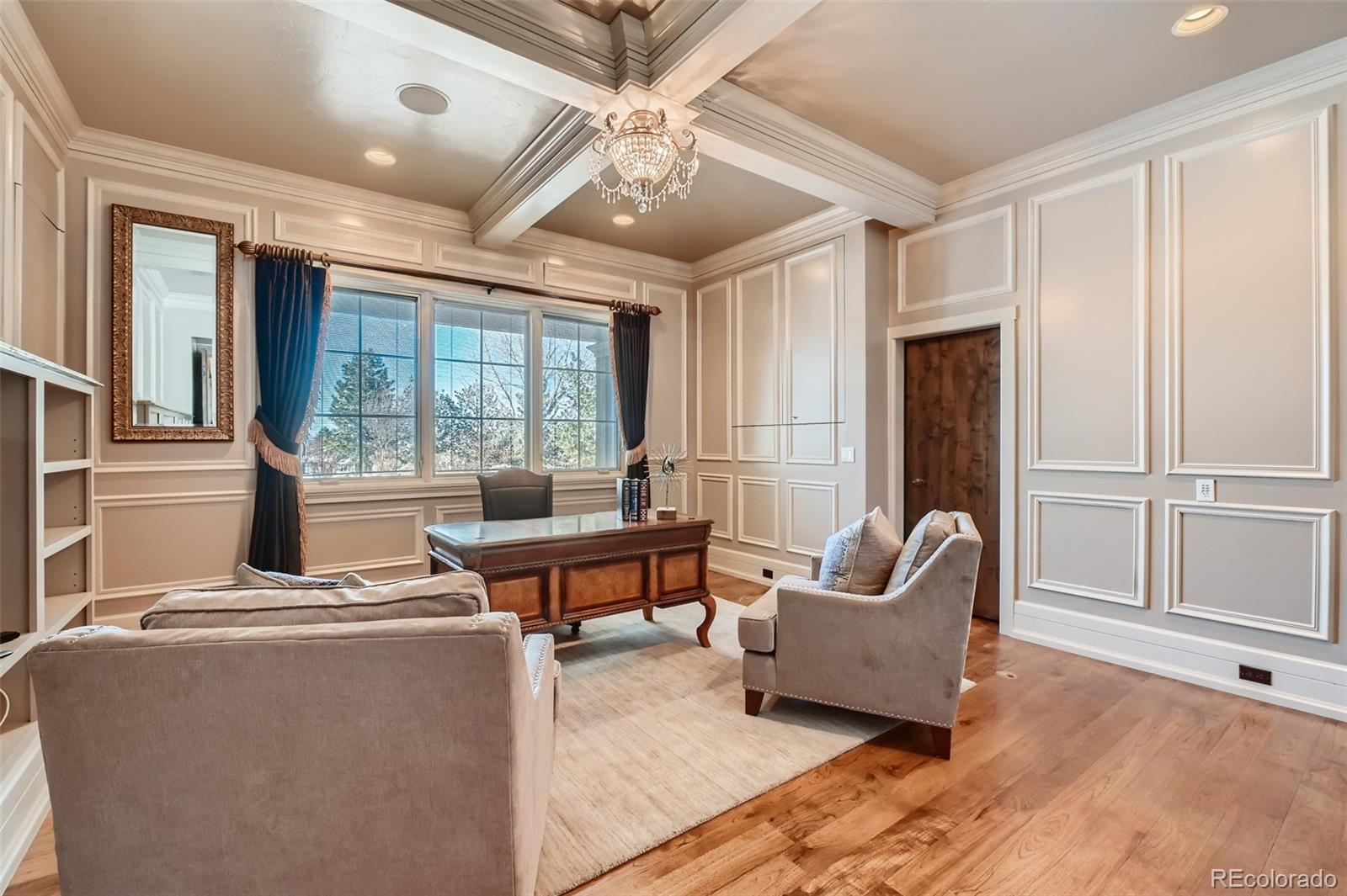 7390 Sagebrush Drive Parker, CO 80138 - Photo 14 of 40 a living room with furniture and a large window