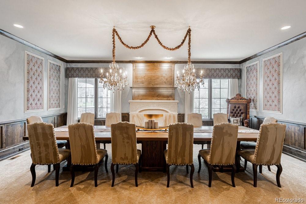 7390 Sagebrush Drive Parker, CO 80138 - Photo 15 of 40 a view of a dining room with furniture window and wooden floor