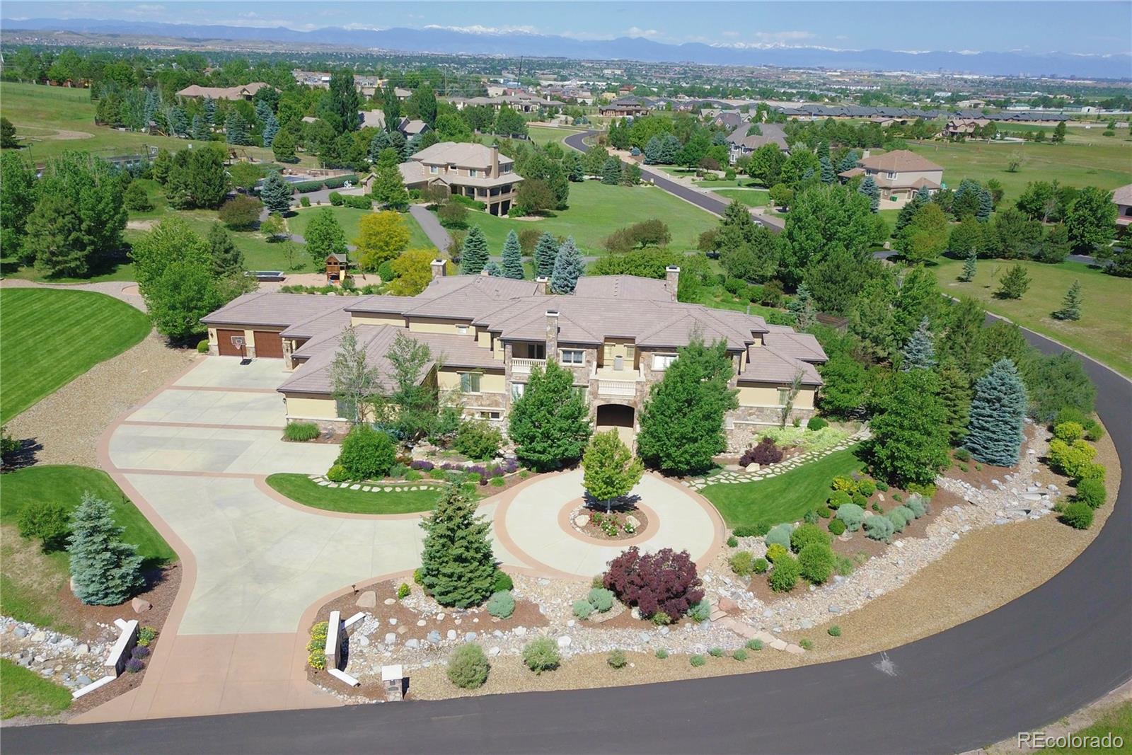 7390 Sagebrush Drive Parker, CO 80138 - Photo 2 of 40 an aerial view of a house with a garden