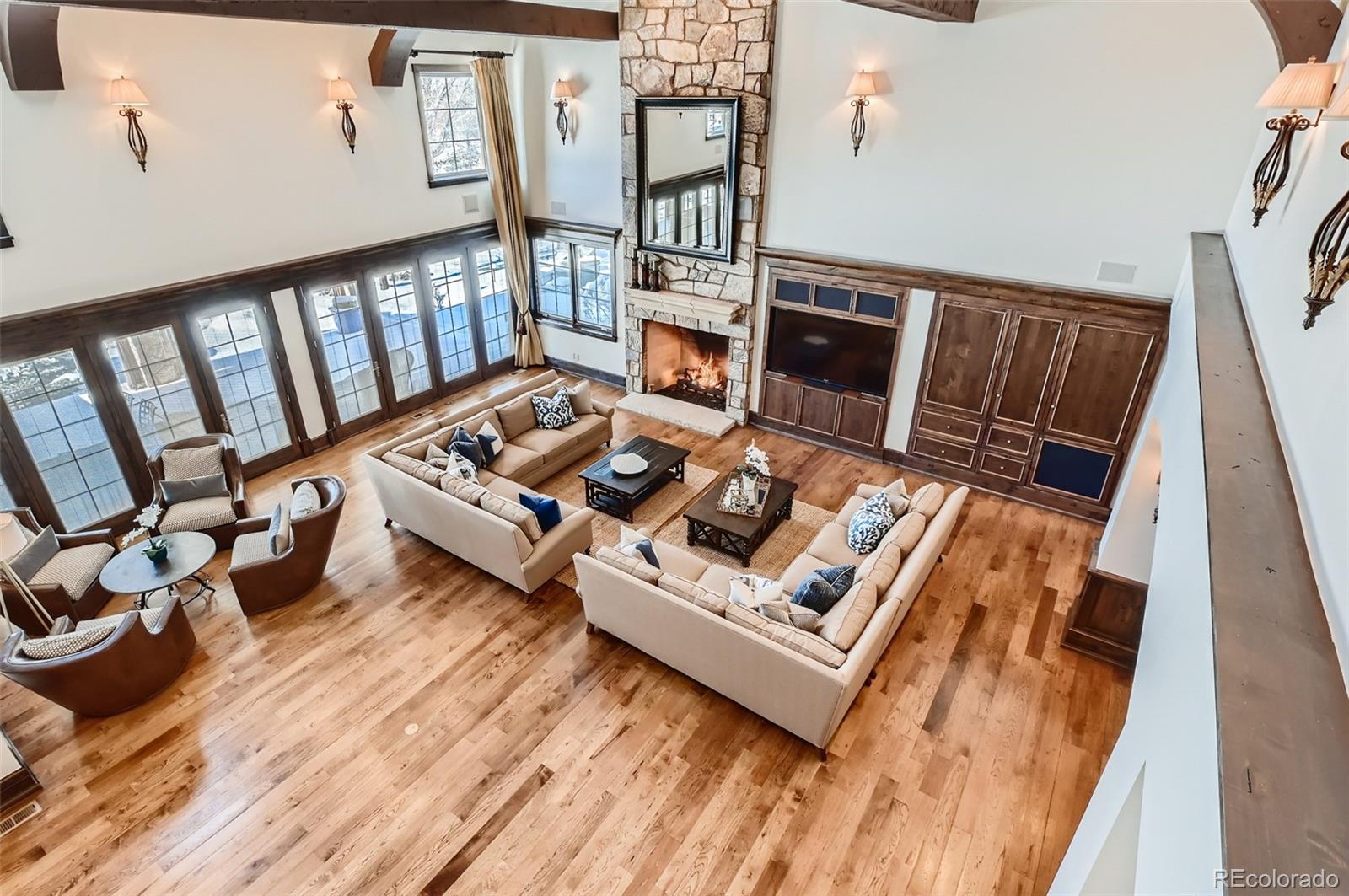 7390 Sagebrush Drive Parker, CO 80138 - Photo 32 of 40 a living room with furniture and a rug