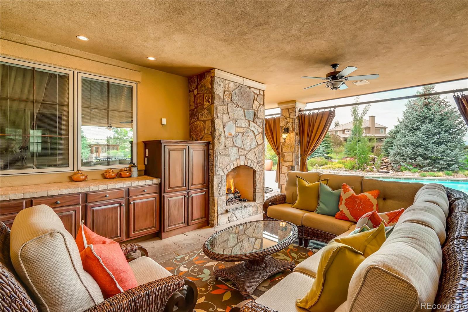 7390 Sagebrush Drive Parker, CO 80138 - Photo 38 of 40 a living room with furniture and a large window