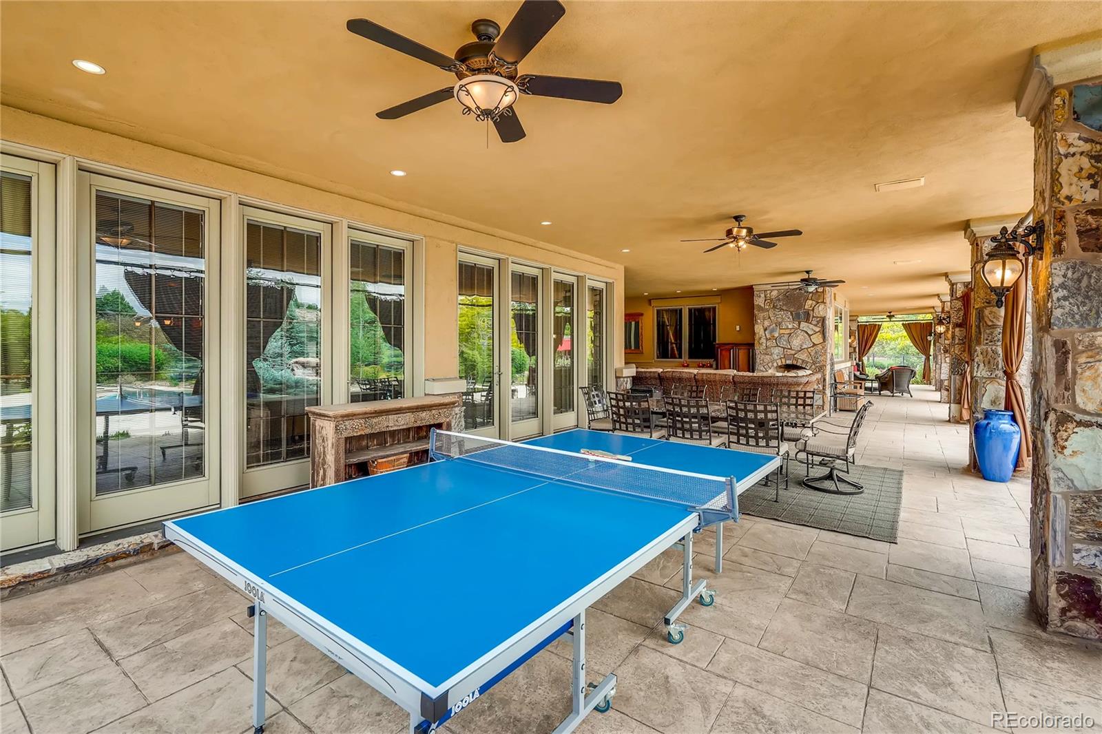 7390 Sagebrush Drive Parker, CO 80138 - Photo 40 of 40 a room with pool table and windows