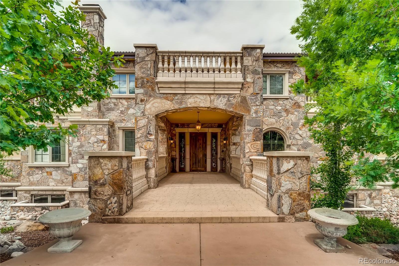 7390 Sagebrush Drive Parker, CO 80138 - Photo 5 of 40 a front view of a house with barbeque oven