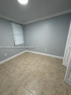 an empty room with window